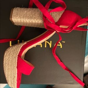 Red , never worn , heels